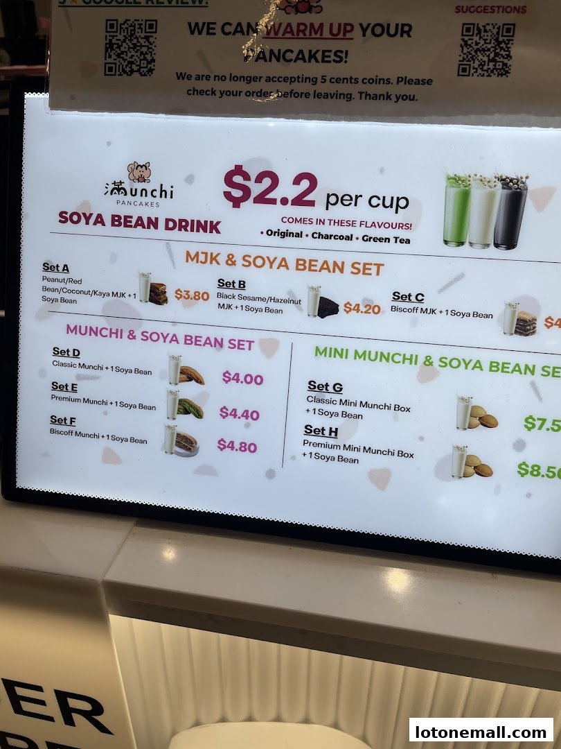 A menu board displaying Soya Bean Drinks and various Munchi & Soya Bean sets with prices.