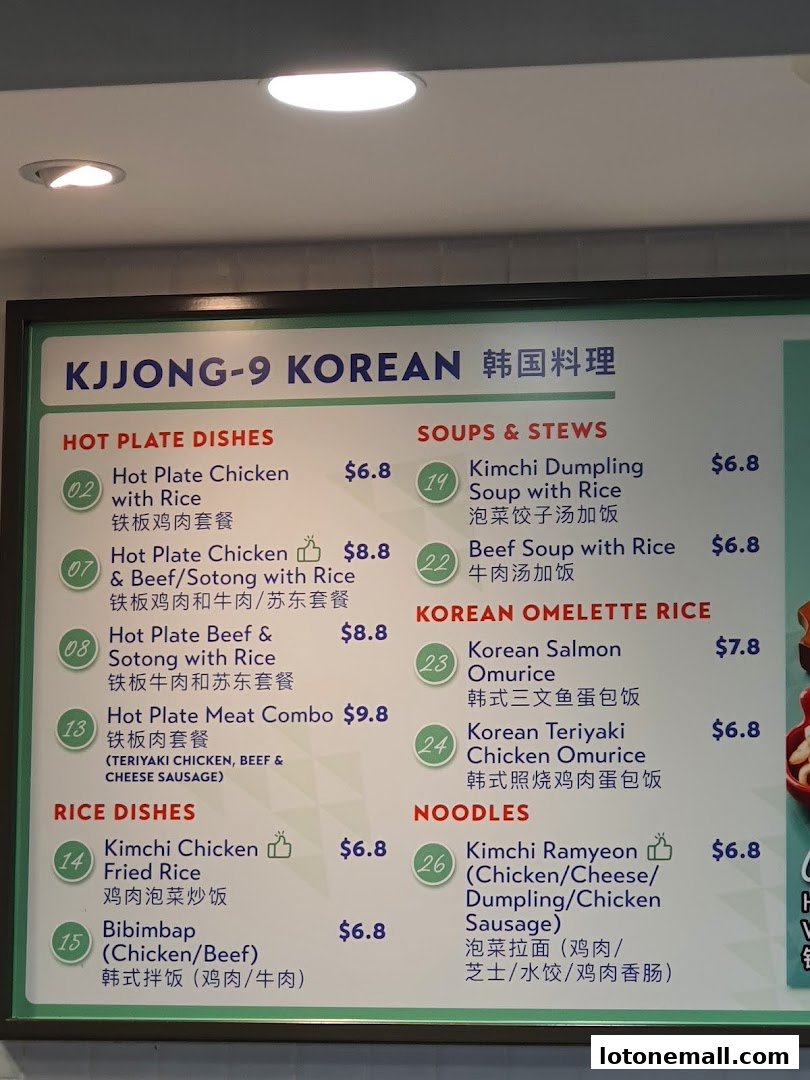 A menu board for KJJONG-9 Korean restaurant, featuring hot plate dishes, soups, rice dishes, noodles, and omelette rice.