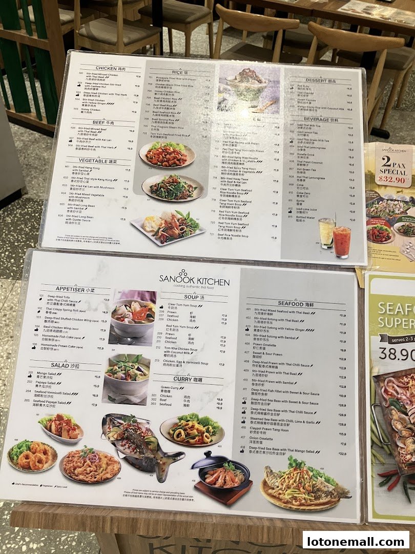 A menu from Sanook Kitchen featuring Thai dishes like chicken, beef, seafood, and soups.