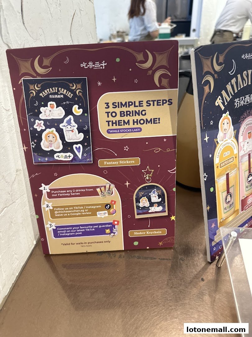 Promotional display for CHICHA San Chen's Fantasy Series drinks with stickers and shaker keychain.