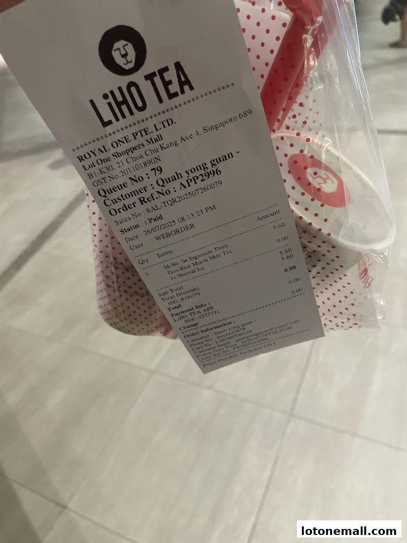 A receipt from LiHO TEA showing a drink order and payment details.