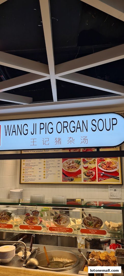 A food stall menu featuring various pork organ soup dishes and other local favorites.