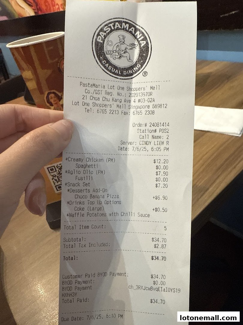 A receipt from PastaMania showing a list of Italian casual dining items and their prices.