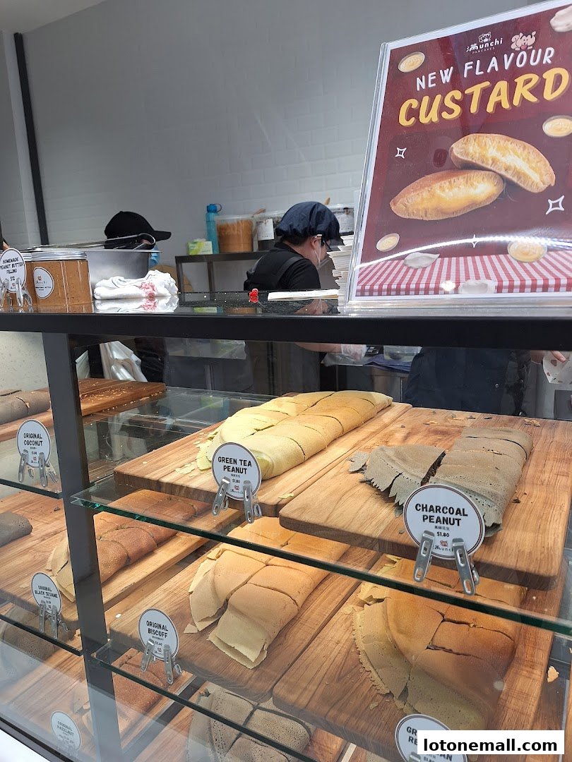 A display case filled with various flavors of pancakes at Munchi Pancakes.