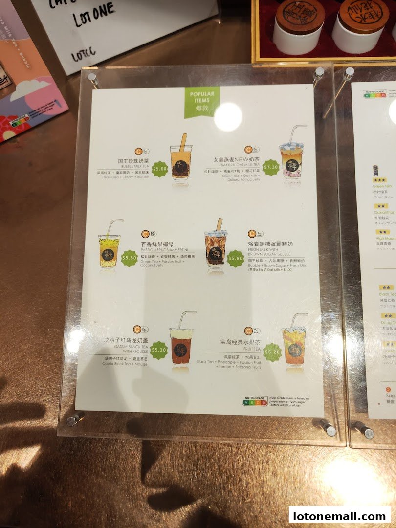 A menu board displaying popular bubble tea drinks with illustrations and prices.