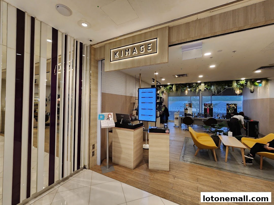 Interior of Kimage Hair Salon with styling stations, waiting area, and reception desk.