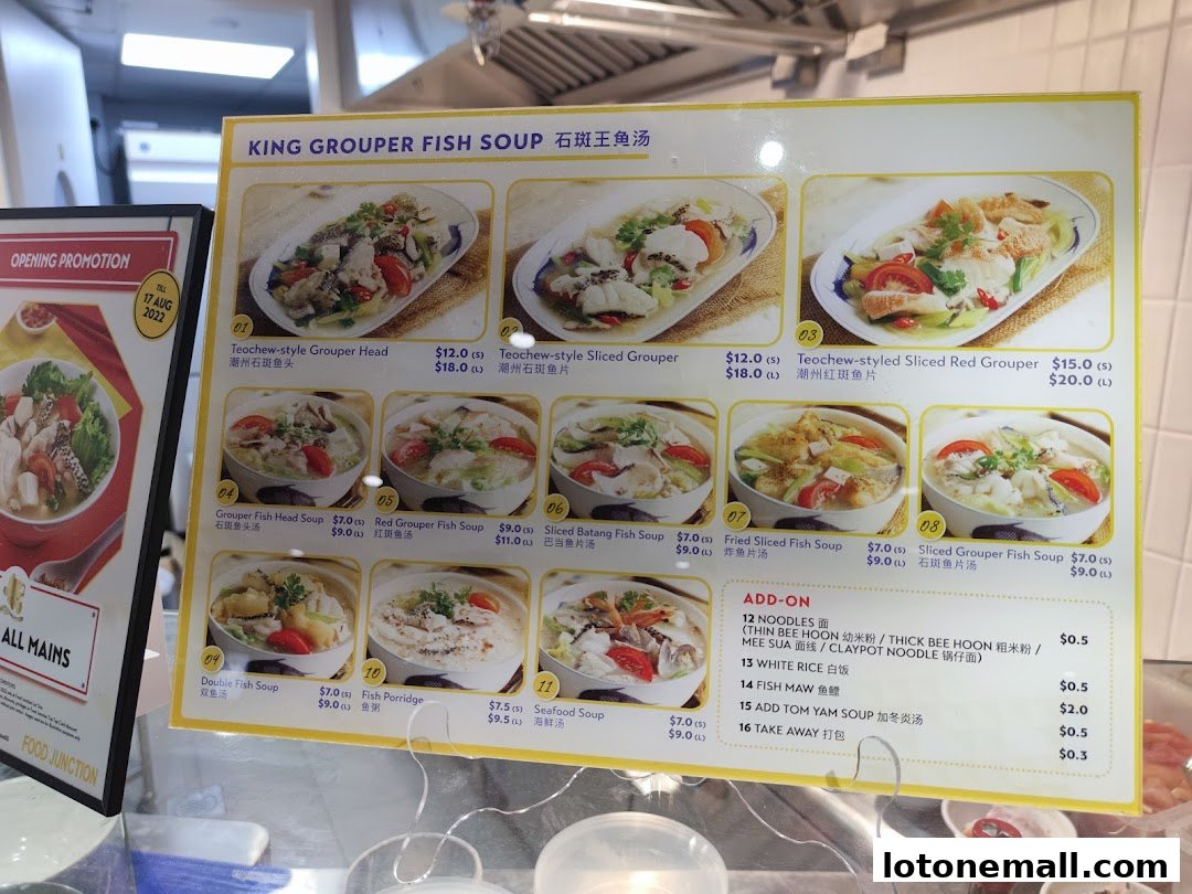 A menu board displaying various King Grouper Fish Soup dishes with prices and images.