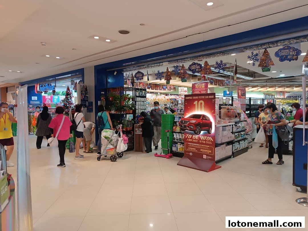 People shopping inside a FairPrice supermarket with Christmas decorations and a car draw promotion.