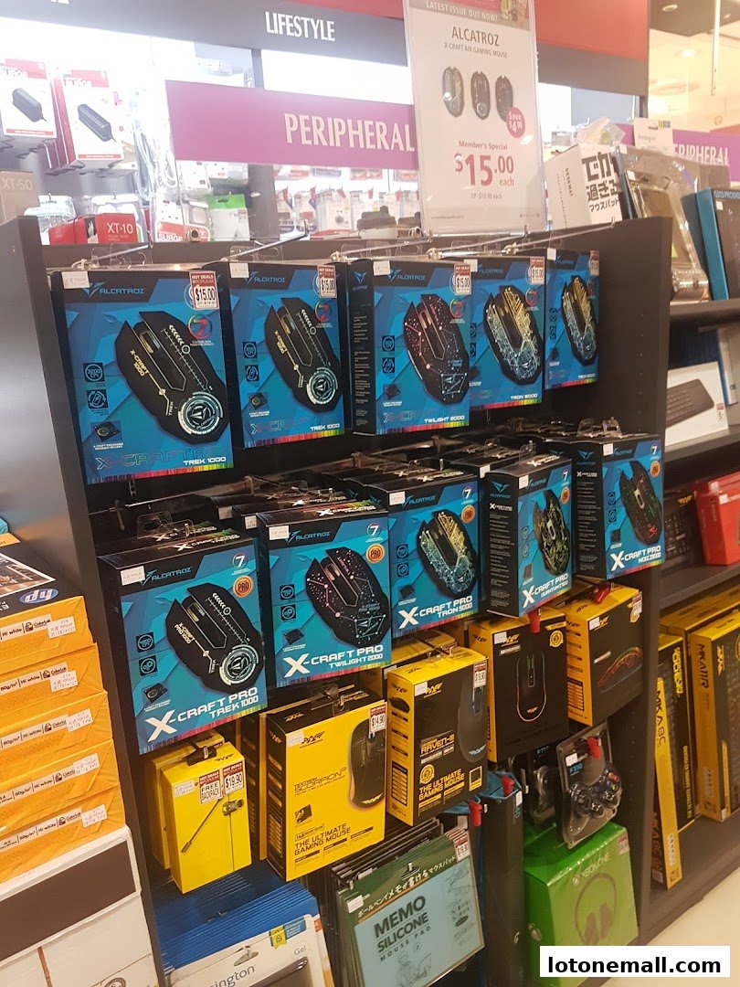 A display of gaming mice and computer peripherals in a retail store.