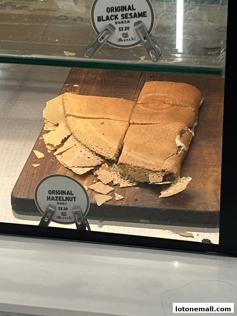 A display of sliced pancakes with labels for Original Black Sesame and Original Hazelnut flavors.