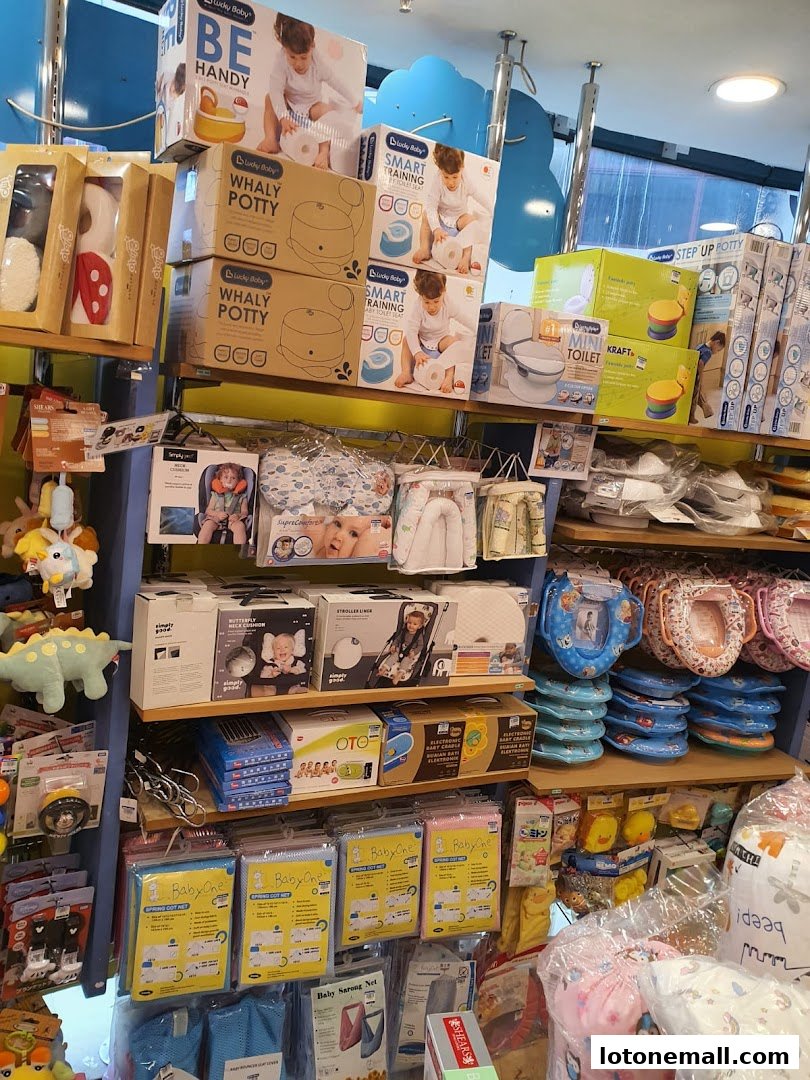 A retail store display featuring baby potty training products and other baby care items.