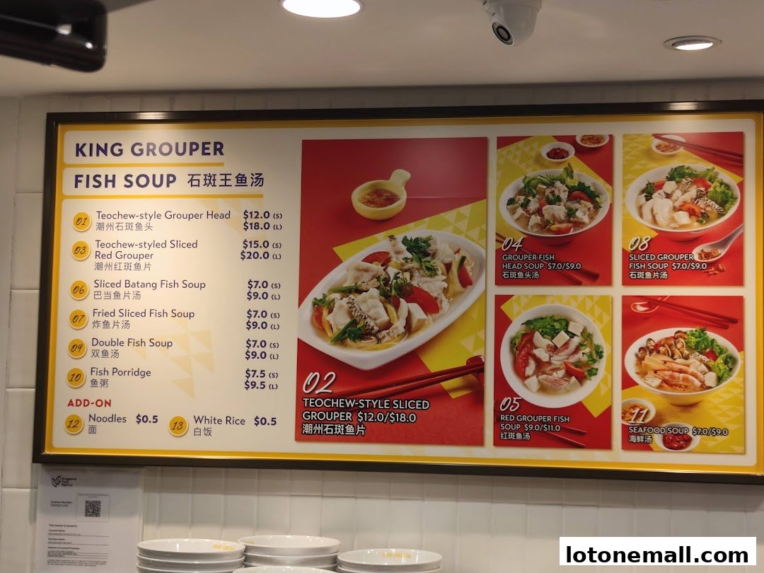 A menu board displaying various fish soup options with prices and appetizing images.