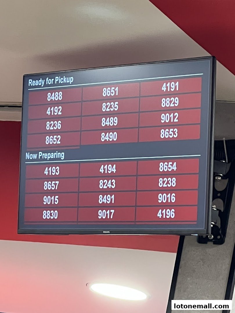A digital display shows order numbers ready for pickup and currently being prepared.