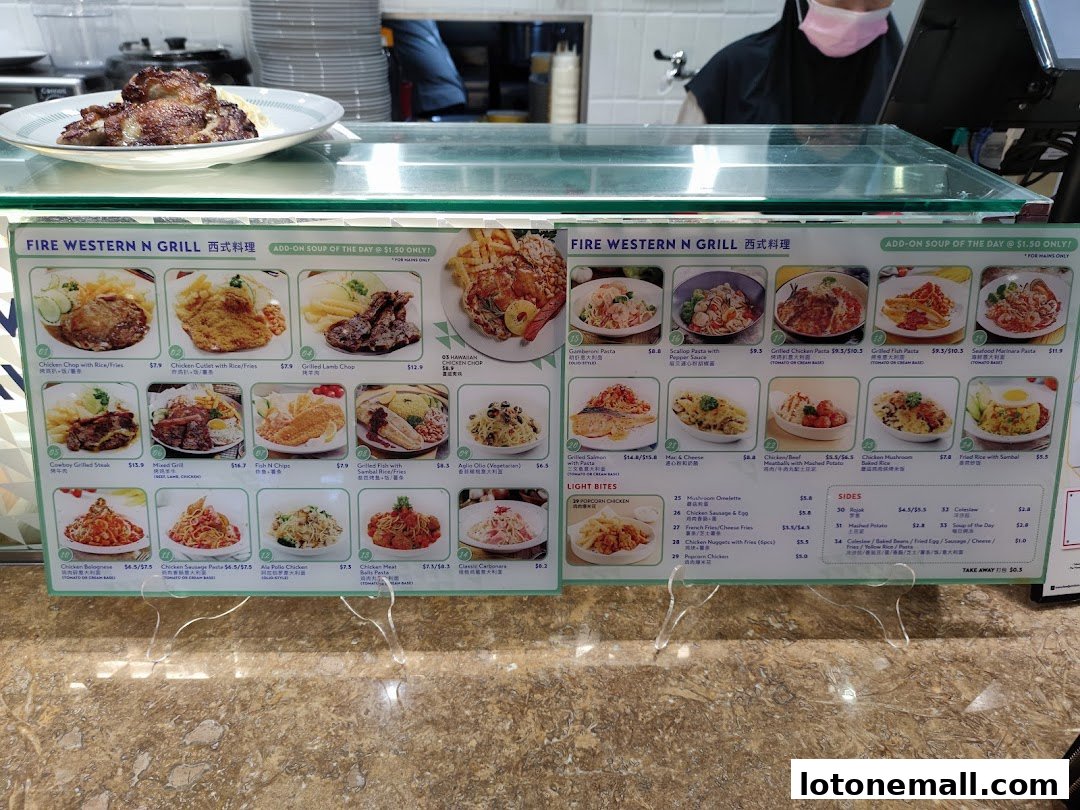 A menu board displaying various Western and grilled dishes with prices.