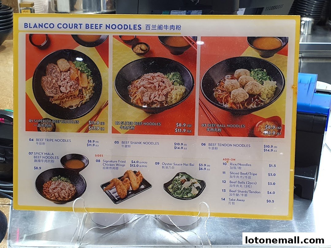 A menu board displaying various beef noodle dishes and sides with prices.