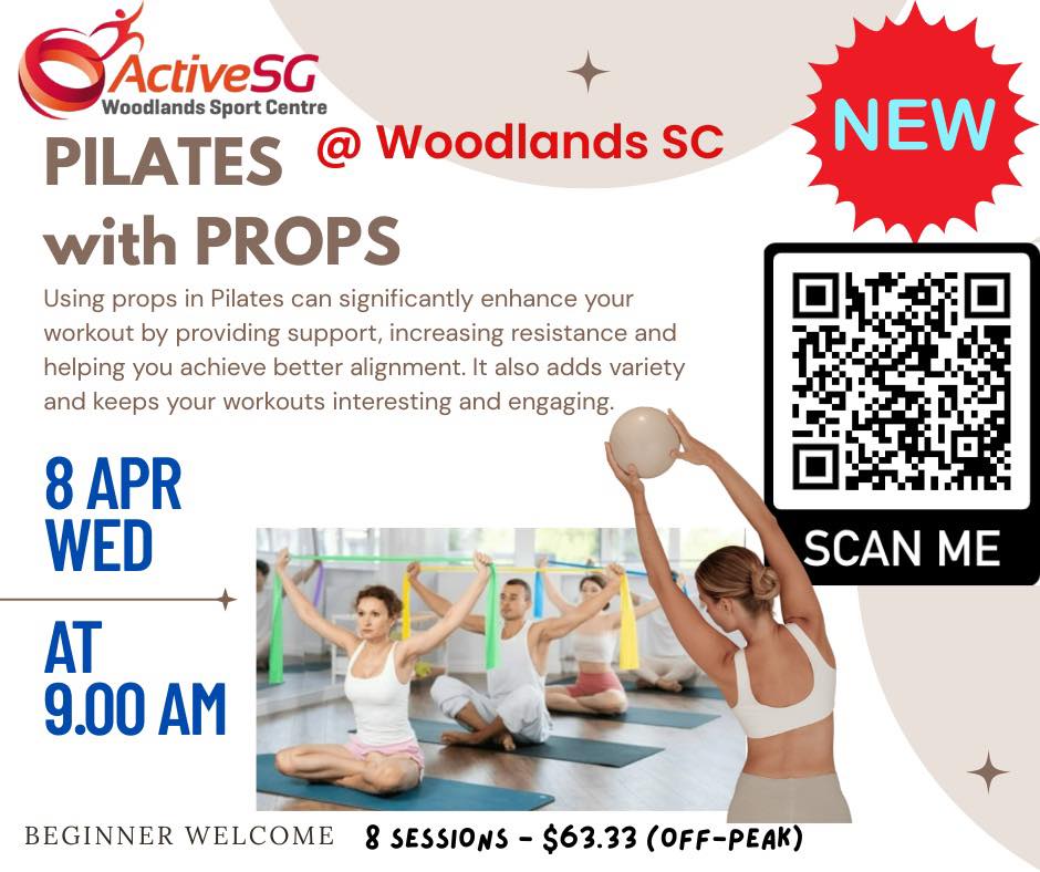 Participants practicing Pilates with supportive equipment.