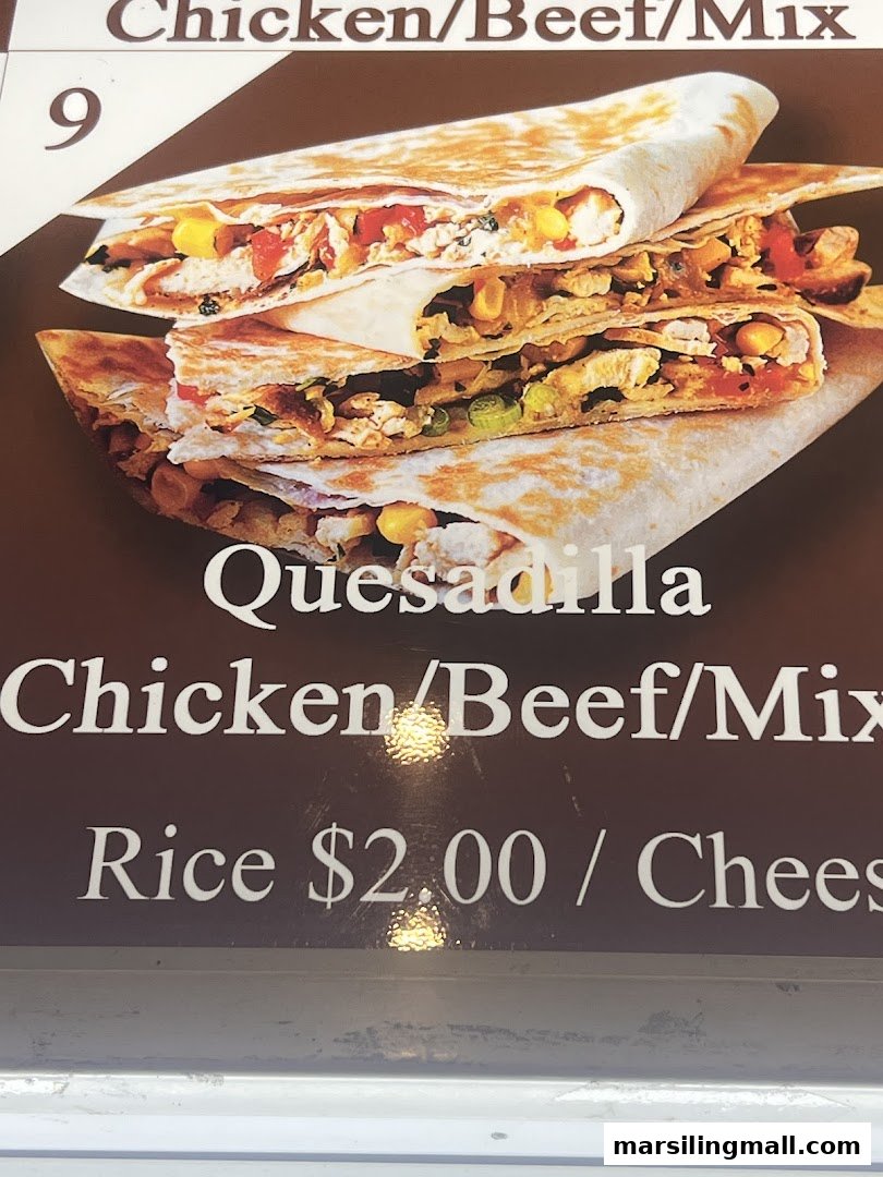 A close-up of delicious quesadillas with chicken, beef, or mixed fillings, and pricing details for add-ons.