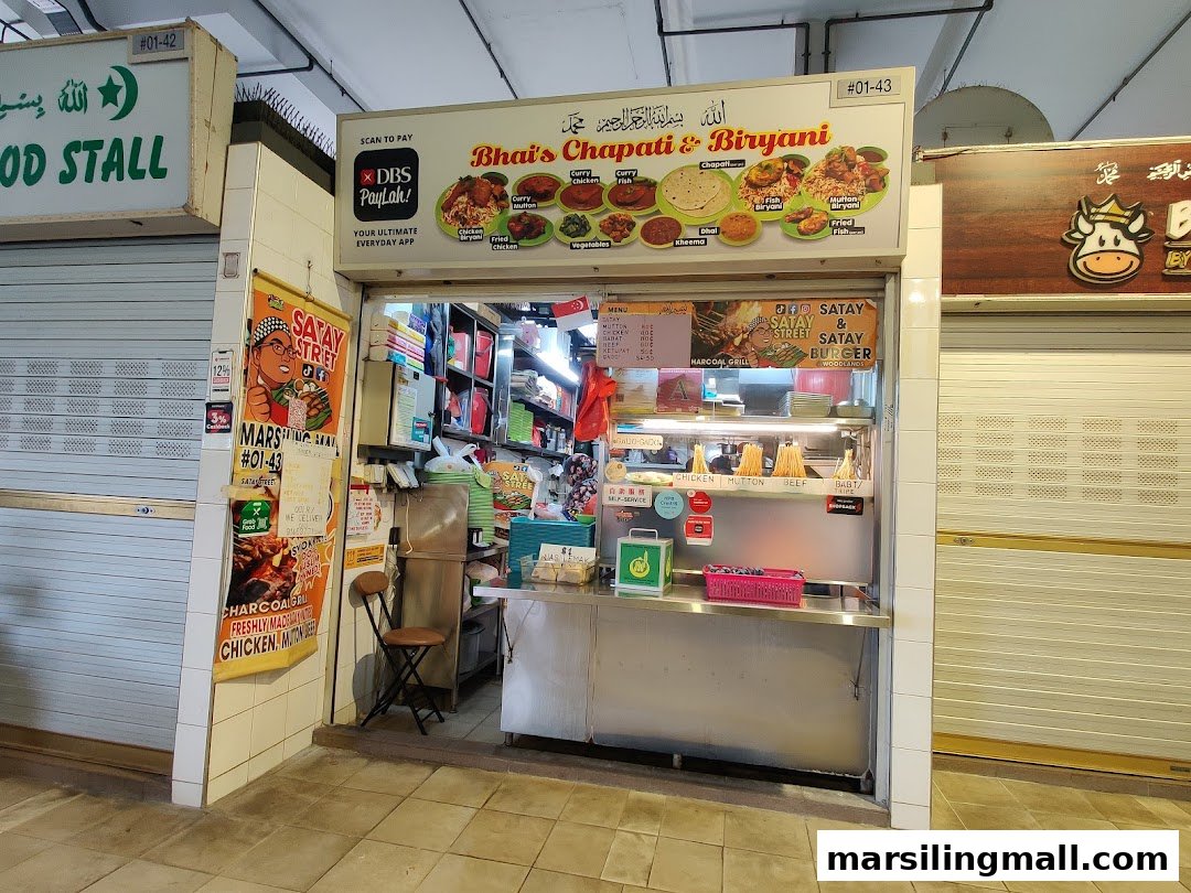 Exterior view of Bhai's Chapati & Biryani, a vibrant food stall offering Indian cuisine.