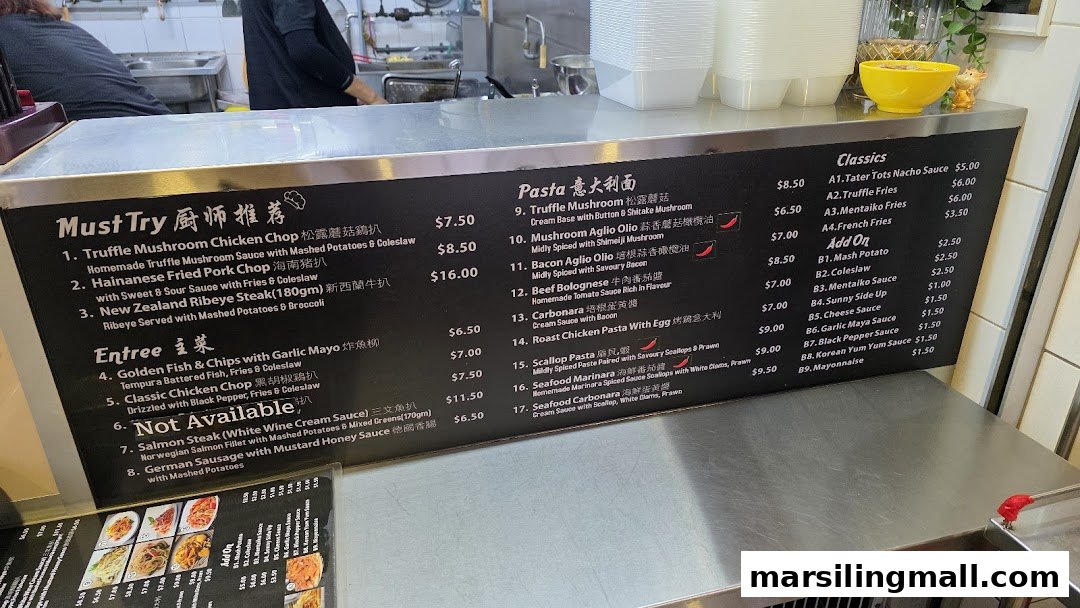 A detailed menu board displaying a variety of Asian fusion and Western dishes with prices.