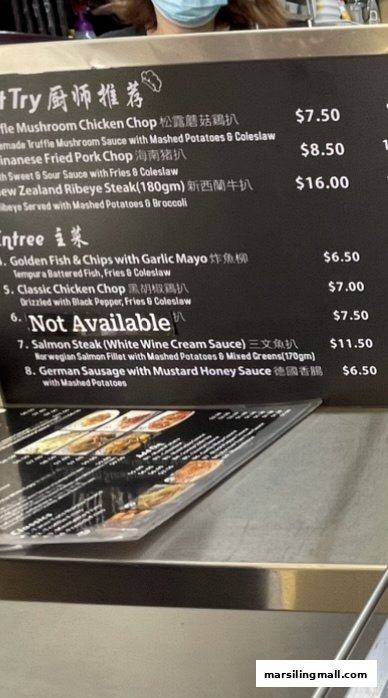 A close-up view of Chef William's menu board displaying Asian Fusion and Western dishes.