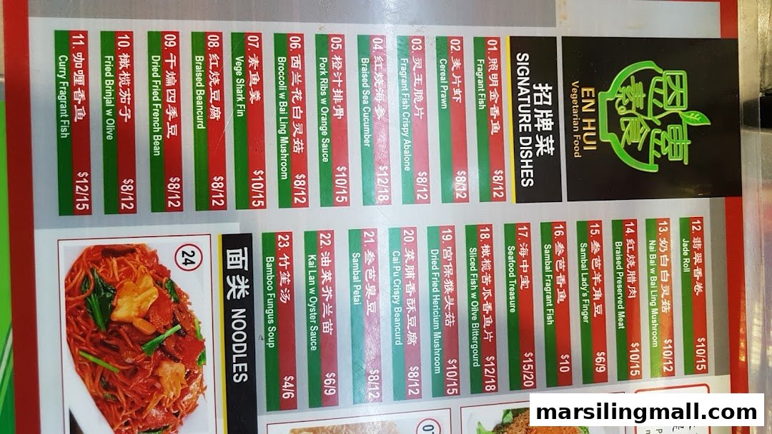 A detailed menu displaying signature dishes, main courses, and noodles from En Hui Vegetarian.