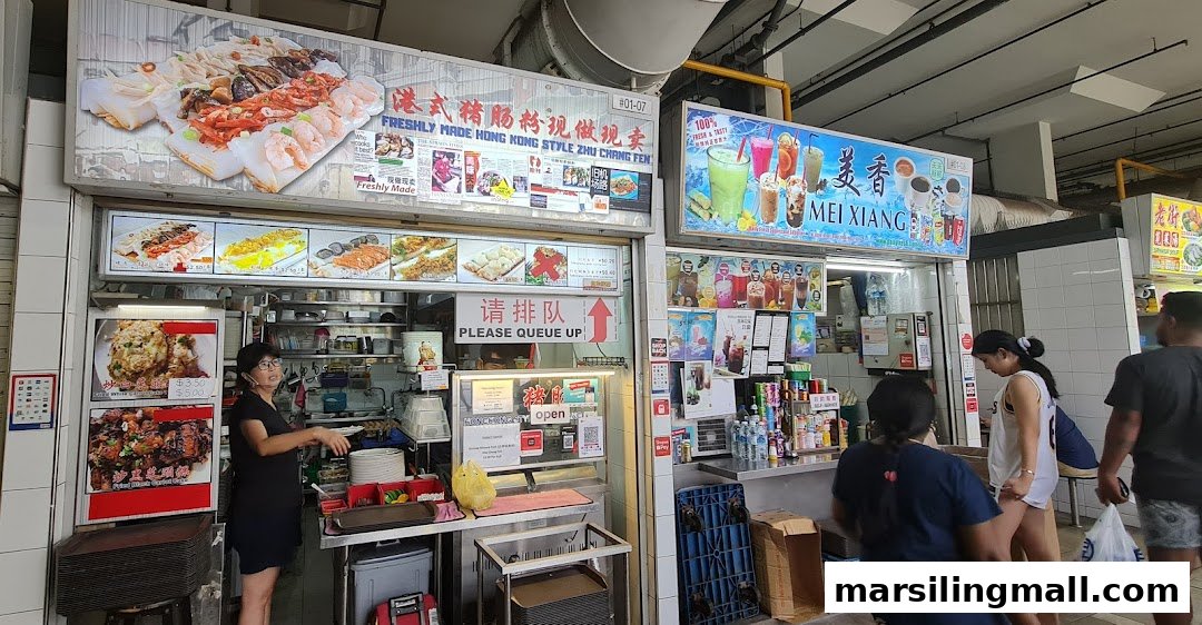The bustling front of 'Freshly Made Hong Kong Style Zhu Chang Fen' stall with customers queuing.