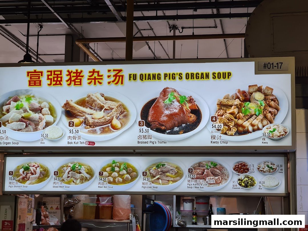 A vibrant menu board showcasing various pig organ soups and traditional dishes with prices.
