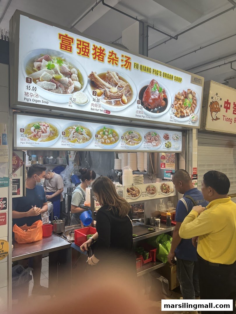 A bustling food stall with a prominent menu board displaying various traditional Chinese soups and dishes.
