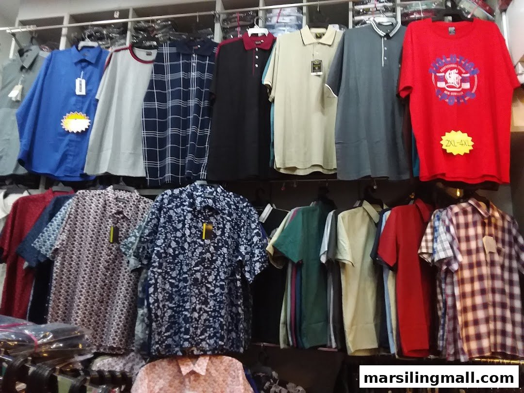 A vibrant display of men's shirts and polo shirts in various colors and patterns.
