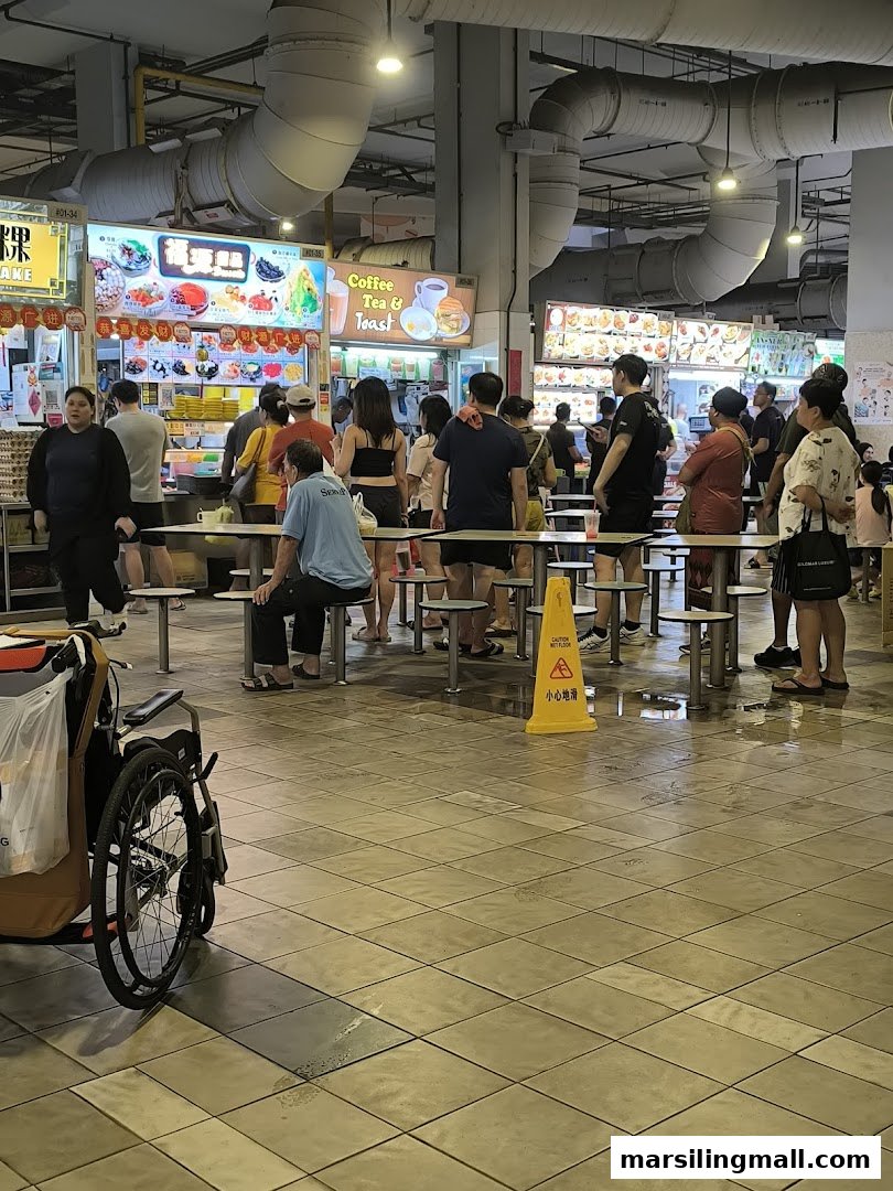 A bustling food court scene with patrons queuing at various stalls, including Hock Guan Desserts.