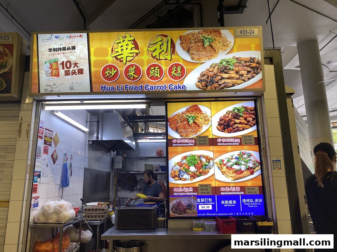 A hawker stall named Hua Li Fried Carrot Cake displaying its menu with food photos and prices.