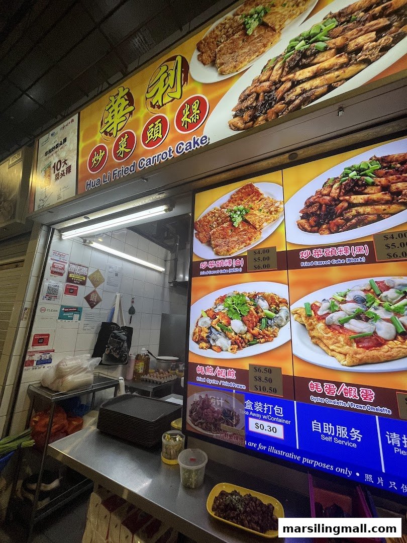 The vibrant menu board of Hua Li Fried Carrot Cake, showcasing their signature dishes and prices.