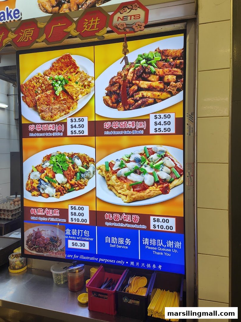 A vibrant menu board displaying various fried carrot cake and omelette dishes with prices.
