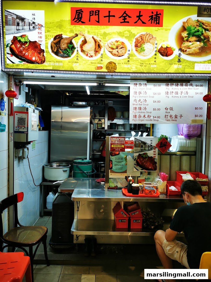 A traditional Chinese food stall featuring a large menu board with various dishes and prices.