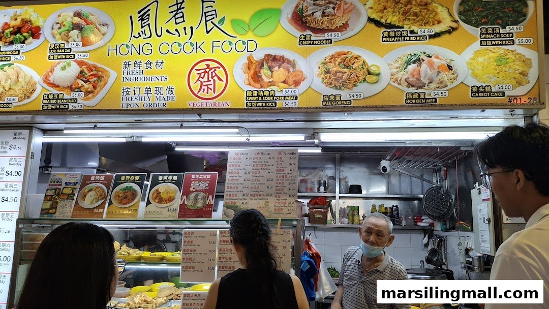 A vibrant hawker stall displaying a comprehensive menu with various local and vegetarian dishes.