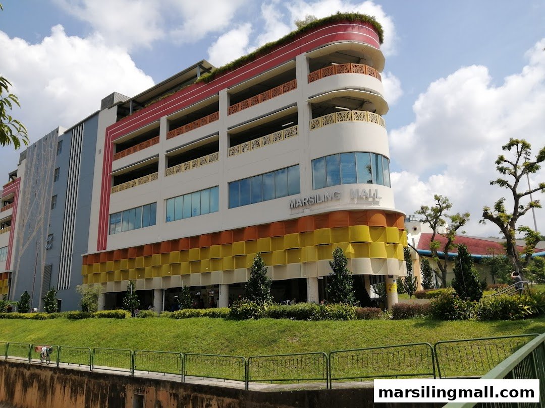 The vibrant exterior of Marsiling Mall under a clear sky.