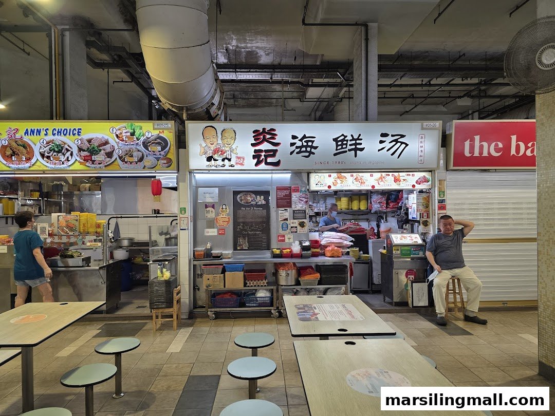 A vibrant hawker centre scene featuring multiple food stalls and dining areas.