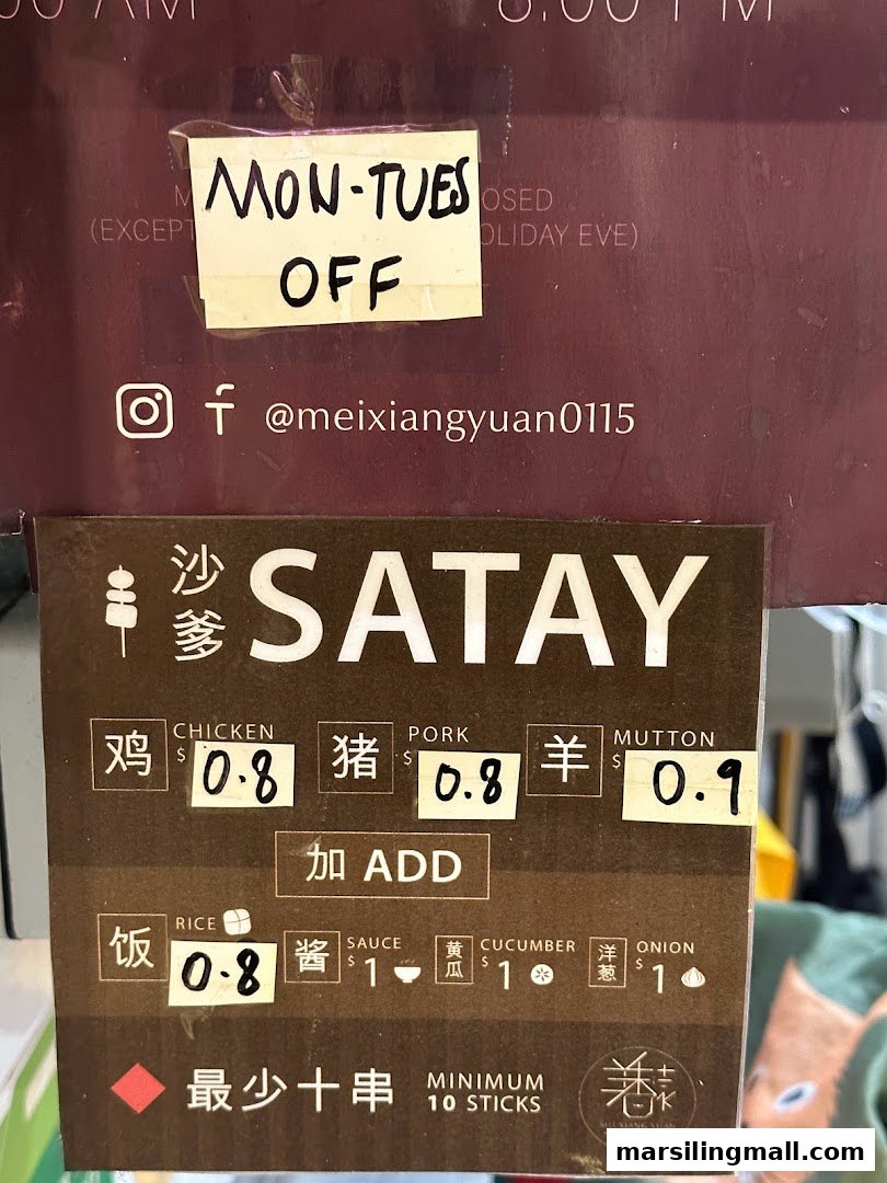 A menu board displaying satay options, prices, add-ons, and closure information for Mei Xiang Yuan.