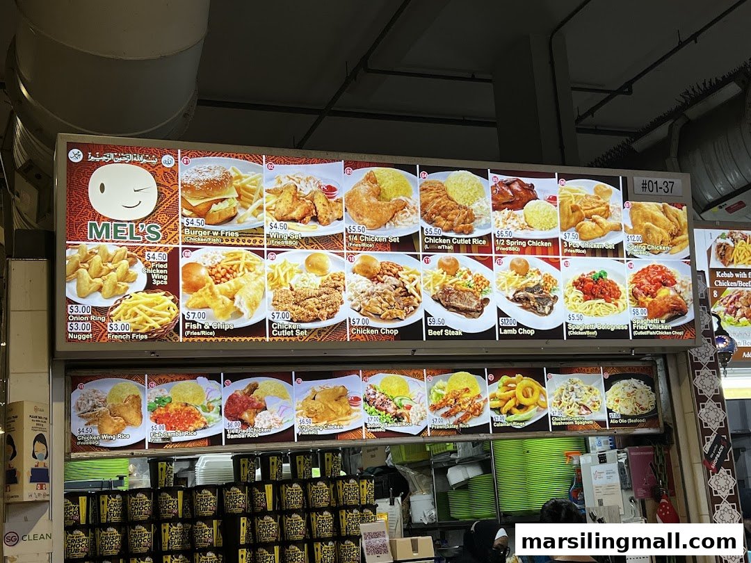 A brightly lit menu board for Mel's Western food stall, showcasing various chicken, beef, and pasta dishes.