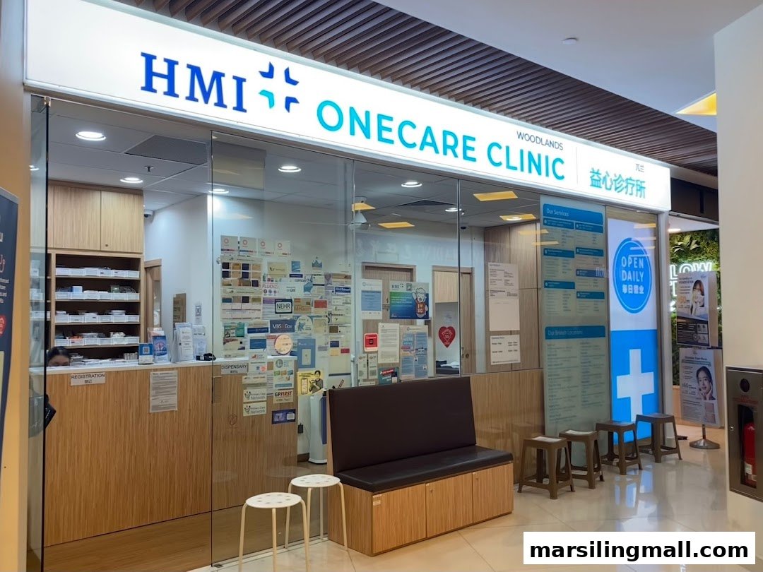 The exterior of OneCare Clinic Woodlands, a medical clinic with a clear glass facade.