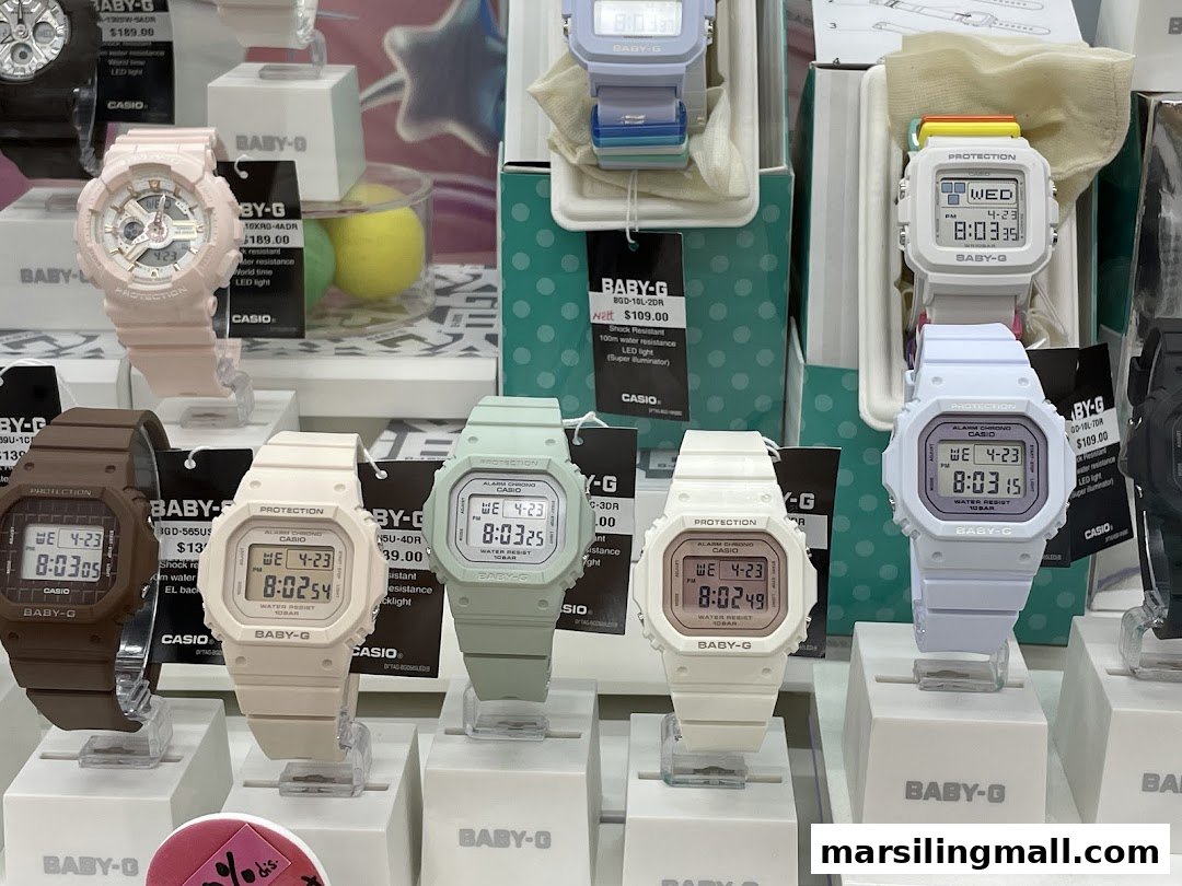 A vibrant display of colorful Baby-G watches, showcasing various models and features.