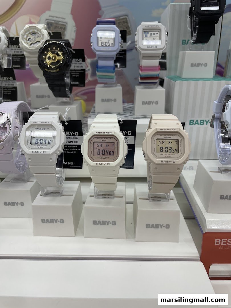 A vibrant display of various Baby-G watches, showcasing different colors and models.
