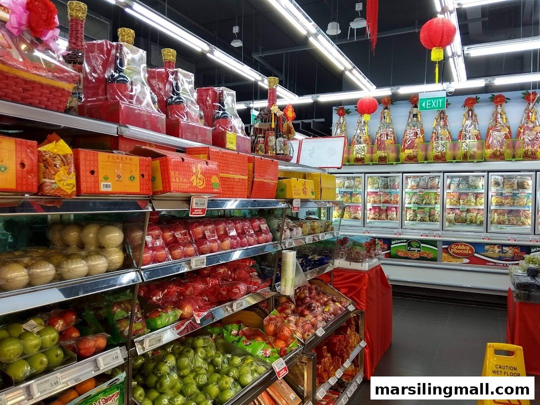 Interior of Sheng Siong Supermarket showcasing fresh produce, packaged goods, and freezer sections.