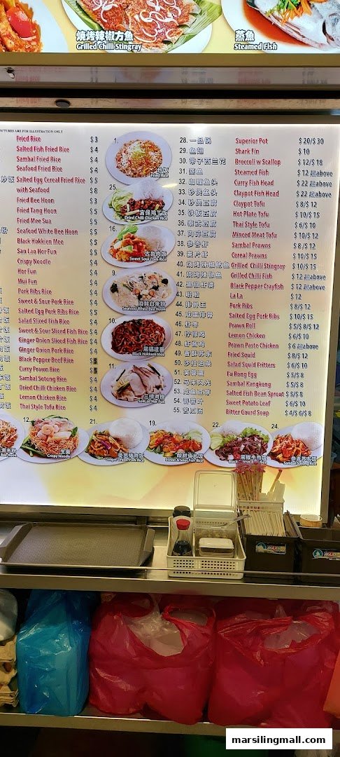 A brightly lit menu board displaying a wide variety of Singaporean Zhi Char dishes and rice/noodle options.
