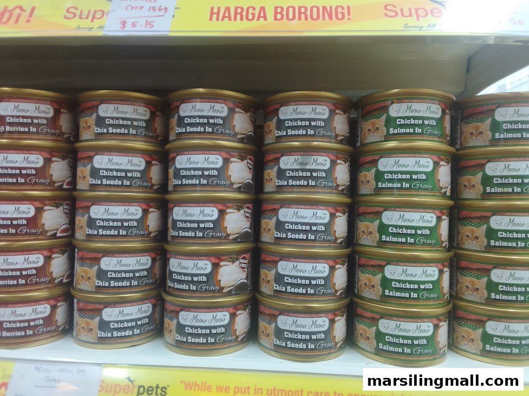 Shelves stocked with various flavors of Meow Meow canned cat food at Superpets Marsiling Mall.