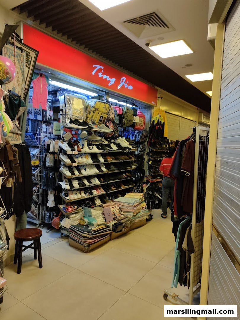 The entrance of Ting Jia shop, showcasing a wide array of shoes, bags, and clothing.