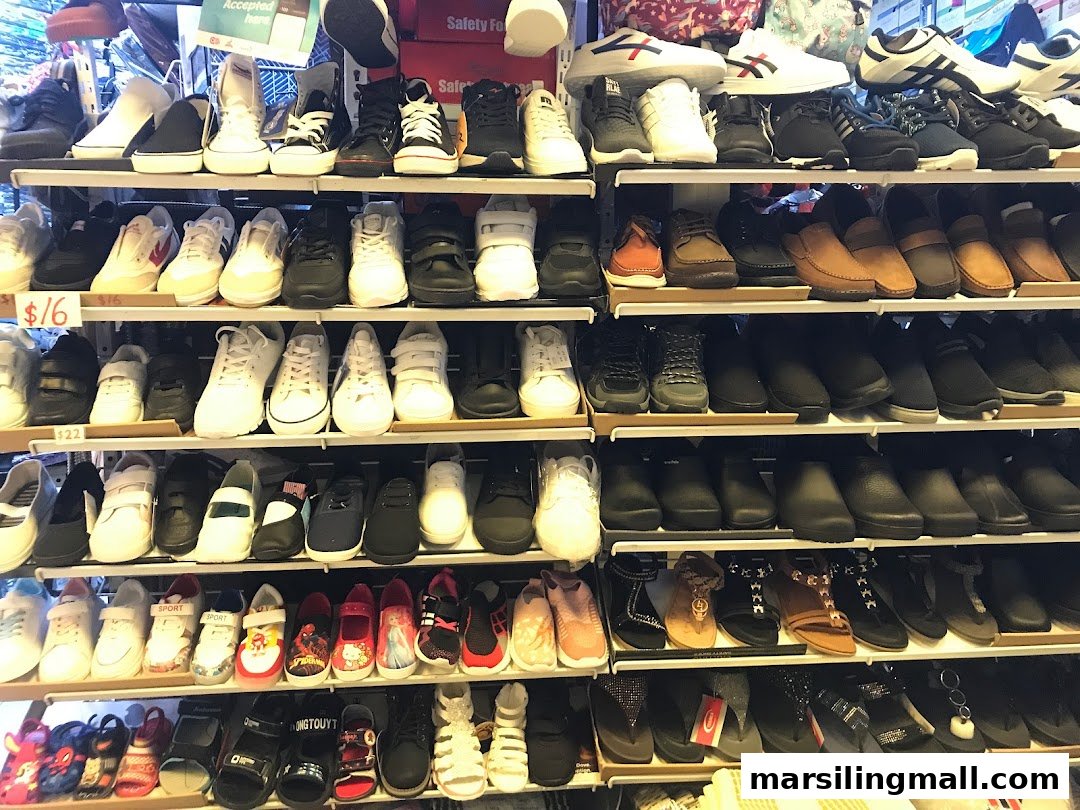 Shelves packed with a wide variety of shoes for all ages and styles at Ting Jia.
