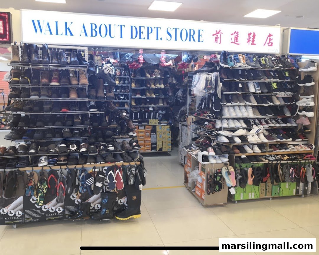 The entrance of 'Walk About Dept. Store' showcasing a wide variety of shoes, boots, and sandals.