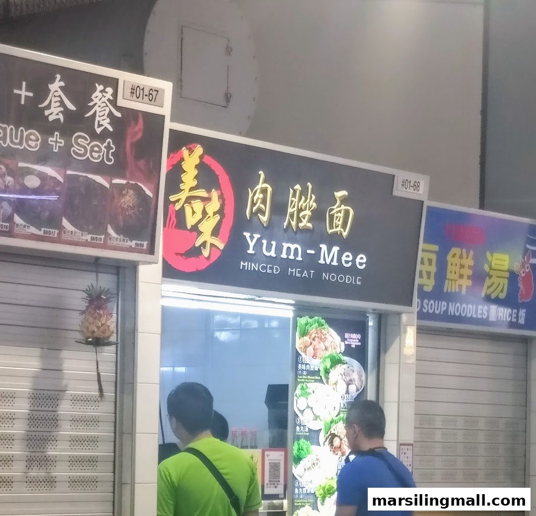 The storefront of Yum-Mee Minced Meat Noodle, a food stall specializing in traditional minced meat noodles.