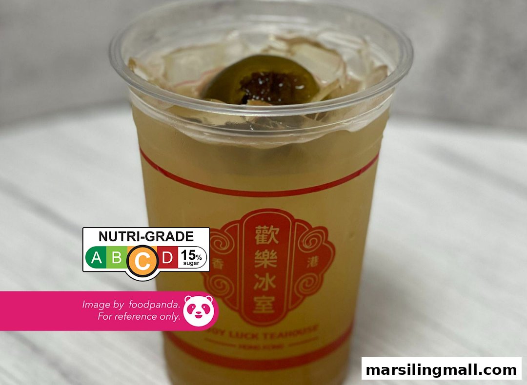 A refreshing iced drink with a preserved plum or olive, featuring a Nutri-Grade label.